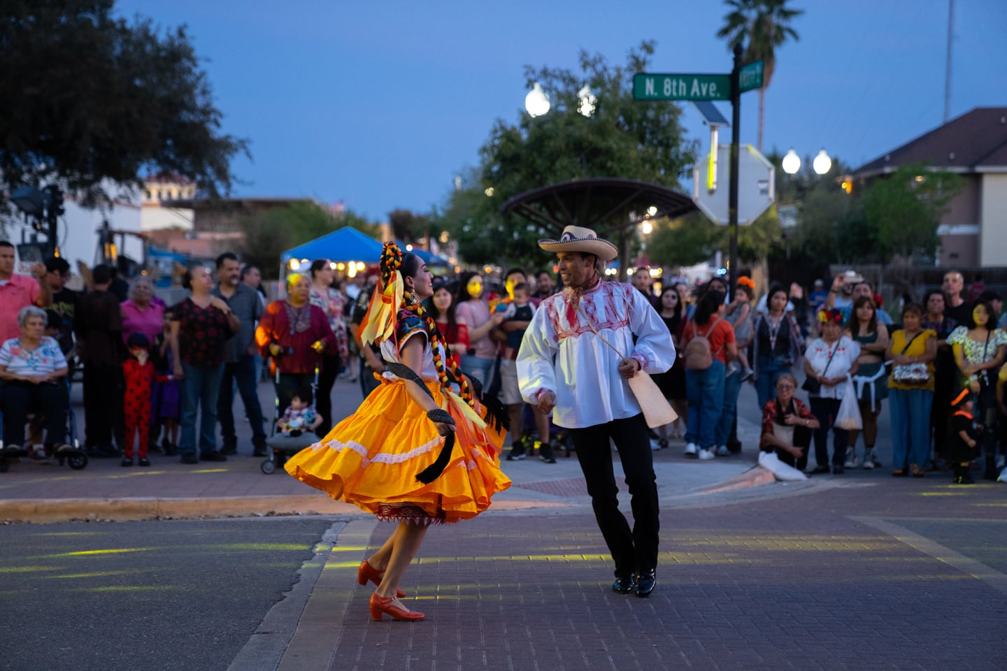 Folklórico dancers performing at a street festival in Edinburg