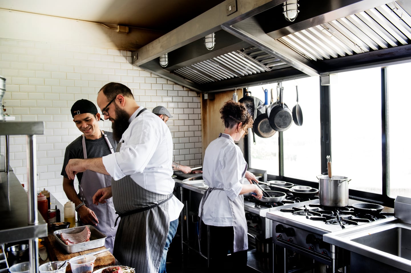 Culinary trainees working in a commercial kitchen in Edinburg